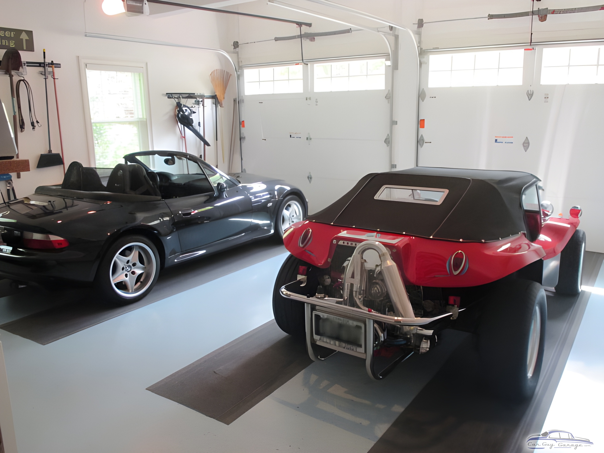 Organized garage with sports cars and wall storage - Bob from Ipswich, Ma