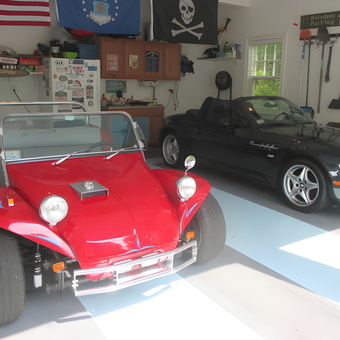 Organized garage with red dune buggy and BMW convertible - Bob from Ipswich, Ma