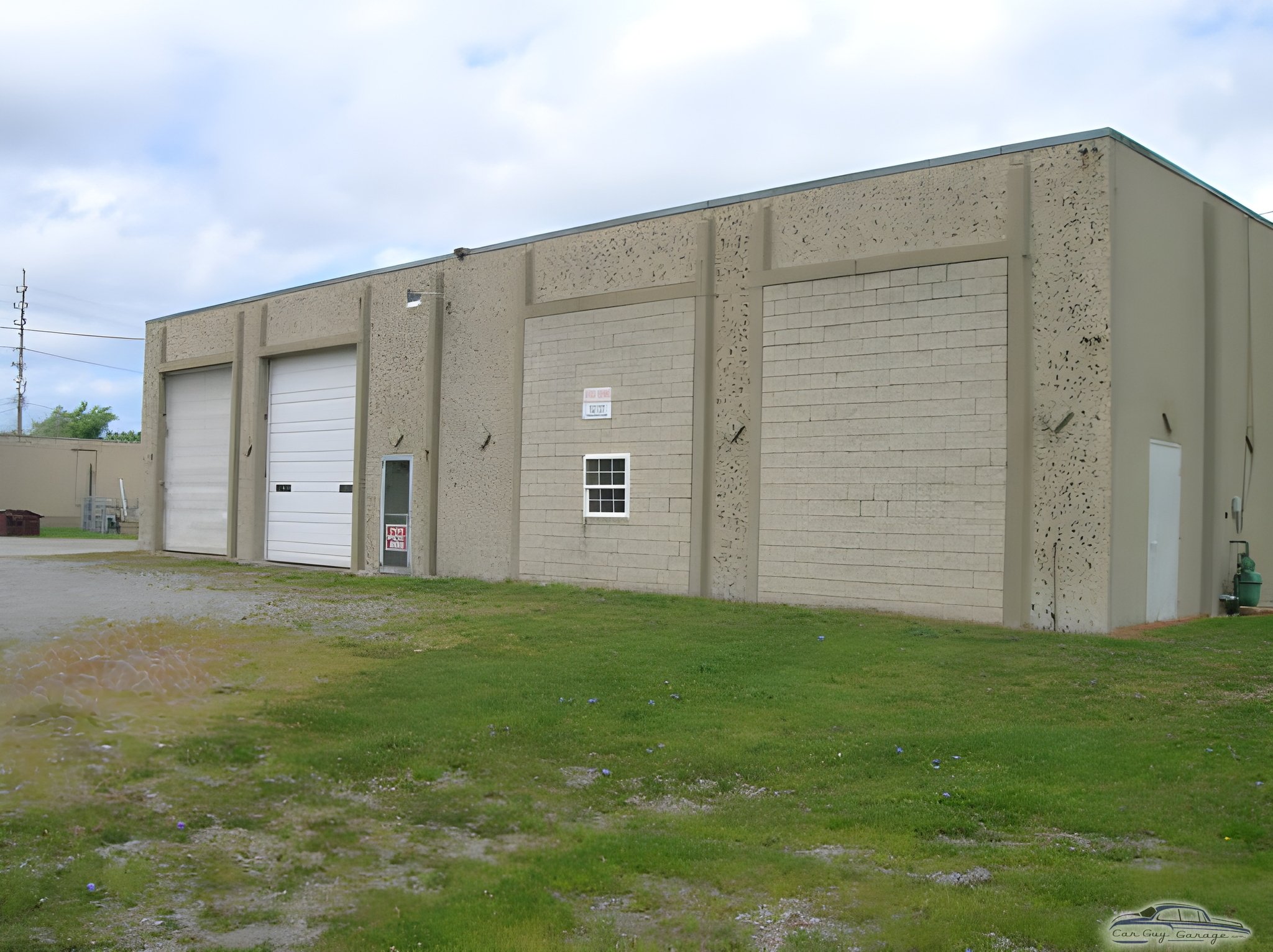 Large industrial garage with roll-up doors - moparforum from austinburg, ohio