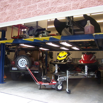 Four post car lift with jet skis and Jeep - Dana from Charleston, WVa