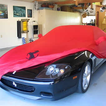 Luxury Car with Red Cover in Organized Garage - Mojo from Phoenix, AZ