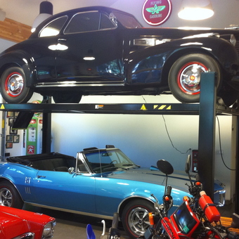 Classic Car Lift with Vintage Cars and Neon Sign - Beau from Chico, CA