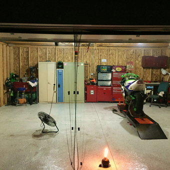Organized Motorcycle Garage With Tool Cabinets and Lift - Mitchell from Chicago, Illinois