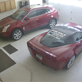 Organized Garage With Red Cars and Storage Cabinets - Phantom 309 from Ray, MI