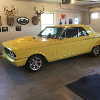 Yellow Classic Ford Car and Wall Decor in Garage - Ron from Esko, MN