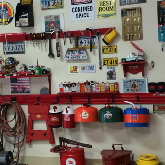 Vintage oil cans, license plates, and garage decor display - Ronnie from Boerne, Texas