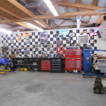 Organized garage with tool chests and checkered wall - Plymouth Dennie from Kennewick, WA