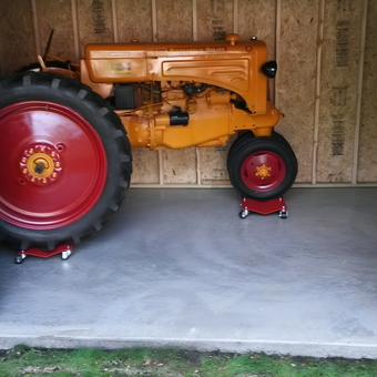 Vintage Tractor on Wheel Dollies in Unfinished Garage - Al from Chanhassen, MN
