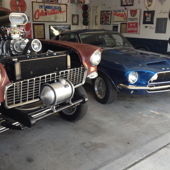 Classic hot rod and blue muscle car in decorated garage - jokerhill from Bakersfield, ca