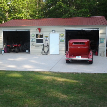 Classic Car Garage With Red Roof and Vintage Decor - Vernon Lewis from Greenwood, South Carolina
