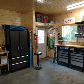 Organized Garage With Tool Cabinets and Workbench - The Brat Guy from Huxley, IA