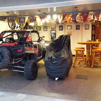 Custom garage with UTV, wall art, and bar stools - Christopher Rohner from Fullerton, CA