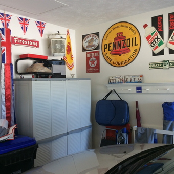 Garage with Vintage Oil Signs and Storage Cabinets - Keith from Bloomington, IL