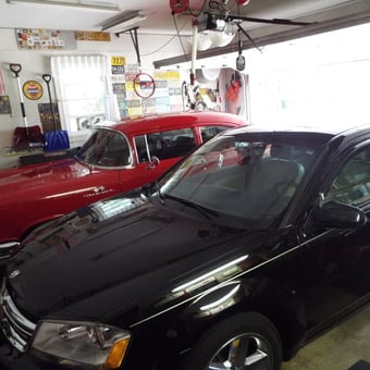Classic Chevy and Modern Car in Decorated Garage - Joseph Sansone from Wilmington, DE