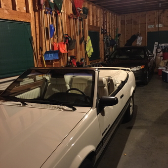 Organized garage with classic convertible and wall tool racks - Kevin from Northbridge, MA
