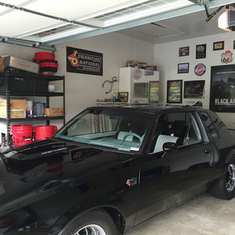 Organized garage with classic car, wall decor, and storage - James from Ellicott City, MD