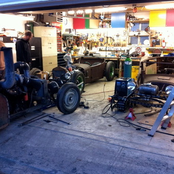 Garage Full of Rat Rods and Tools - piles of rat rods from Airdrie, Alberta