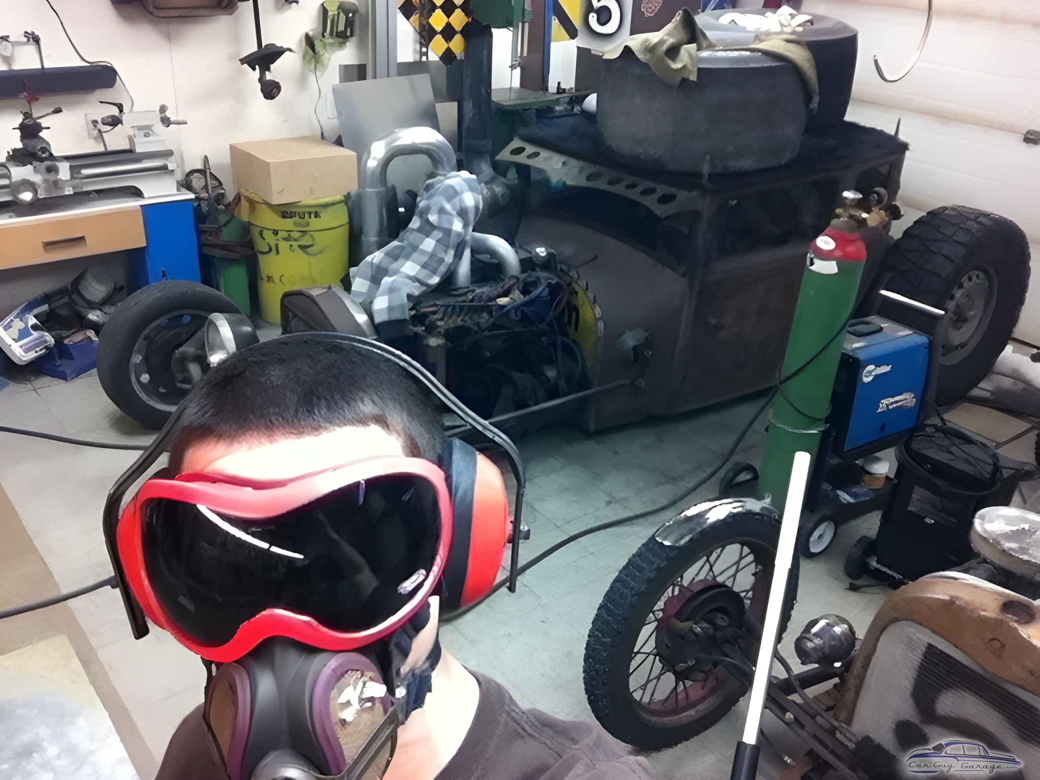 Garage with Rat Rods, Tools, and Equipment - piles of rat rods from Airdrie, Alberta