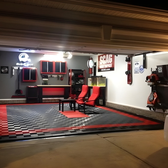 Modern garage with checkered floor and cabinets - Brigo from Lindenwold, NJ