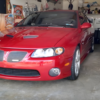 Red Pontiac GTO in Organized Garage - Houlie from Spencer, Massachusetts