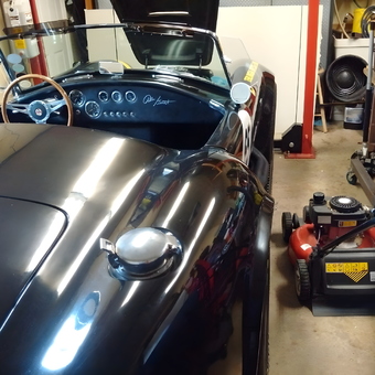 Classic Roadster and Lawn Mower in Organized Garage - Automan from Waterloo, Ontario
