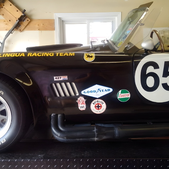 Classic race car with decals and side pipes - Automan from Waterloo, Ontario
