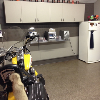 Organized Garage with Cabinets, Motorcycle, and Fridge - 10Degrees from Holland, MI