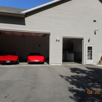 Spacious Garage With Two Red Sports Cars - carnie from Monticello, WI