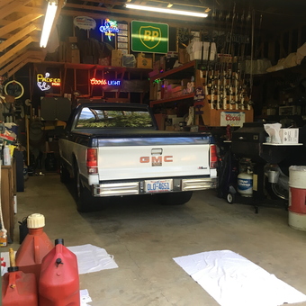 Garage with GMC Truck, Neon Signs, and Storage - Buddy from Garner, North Carolina