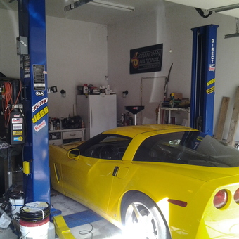 Garage with Car Lift, Tools, and Yellow Corvette - Boone from New Bern, N C