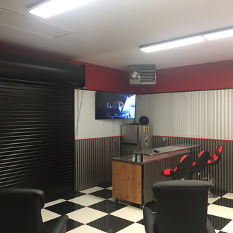 Checkered Floor Garage With Bar Stools and Tool Chest - Rusty from Casper, Wyoming