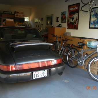 Organized garage with Porsche, bikes, and wall art - Spence from Richland, WA