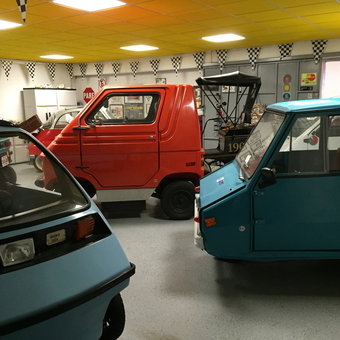 Vintage microcars and garage decor display - Fernando from San Juan, PR