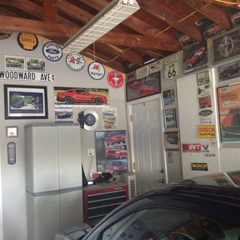 Classic Car Garage Decor with Signs and Cabinets - Nonno from Livonia, Michigan