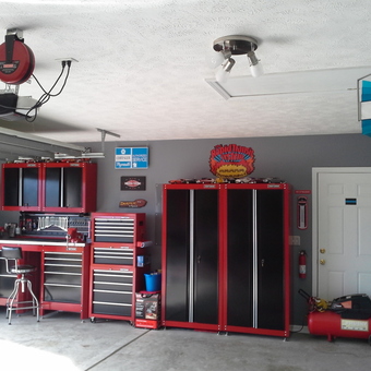 Organized garage with red cabinets and tool chests - Louis from Myrtle Beach, South Carolina