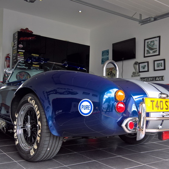 Classic blue Cobra and wall art in a tiled garage - Trevor from Durham, England