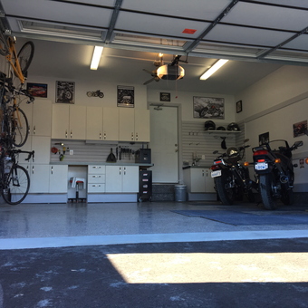 Organized garage with bikes, motorcycles, and cabinets - Dave from Ottawa, Ontario