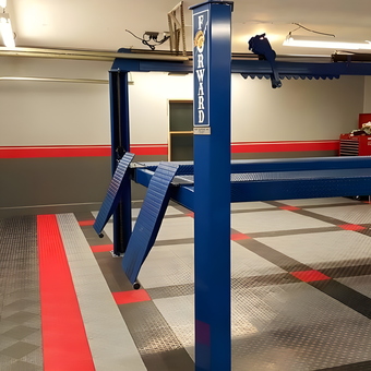 Modern garage with car lift and tile floor - Mike from Genoa, Il