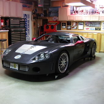 Custom sports car and tool storage in organized garage - Mike from Ballwin, MO