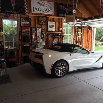 Organized garage with Corvette, banners, and tools - Keith G from Camden, SC