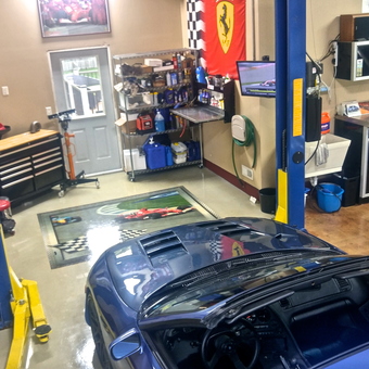 Organized garage with car lift, cabinets, tool chest - Pablo from Shawnee, KS