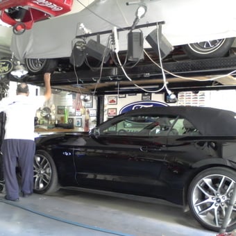 Home Garage with Car Lift, Ford Signs, and Mustang - Jim from Disney, Ok