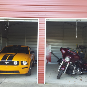 Yellow Mustang, Motorcycle, and Shelving in Metal Garage - Dan Cash from Trafford, Alabama