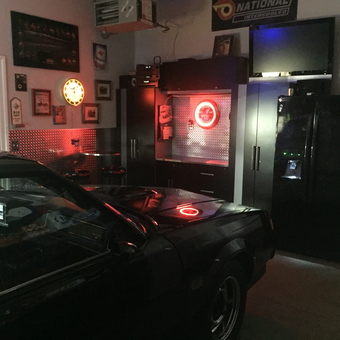 Garage with Neon Clocks, Cabinets, and Car - MKNBOOST from Lewiston, New York