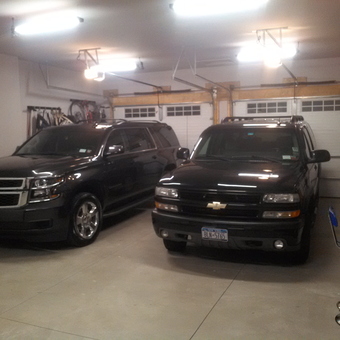 Organized Garage With Two Chevy SUVs and Workbench - MKNBOOST from Lewiston, New York