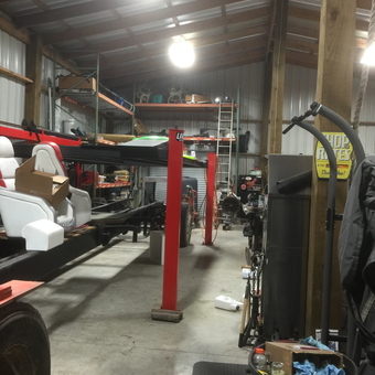 Spacious garage with car lift and storage racks - Sprink from Beaumont, Tx