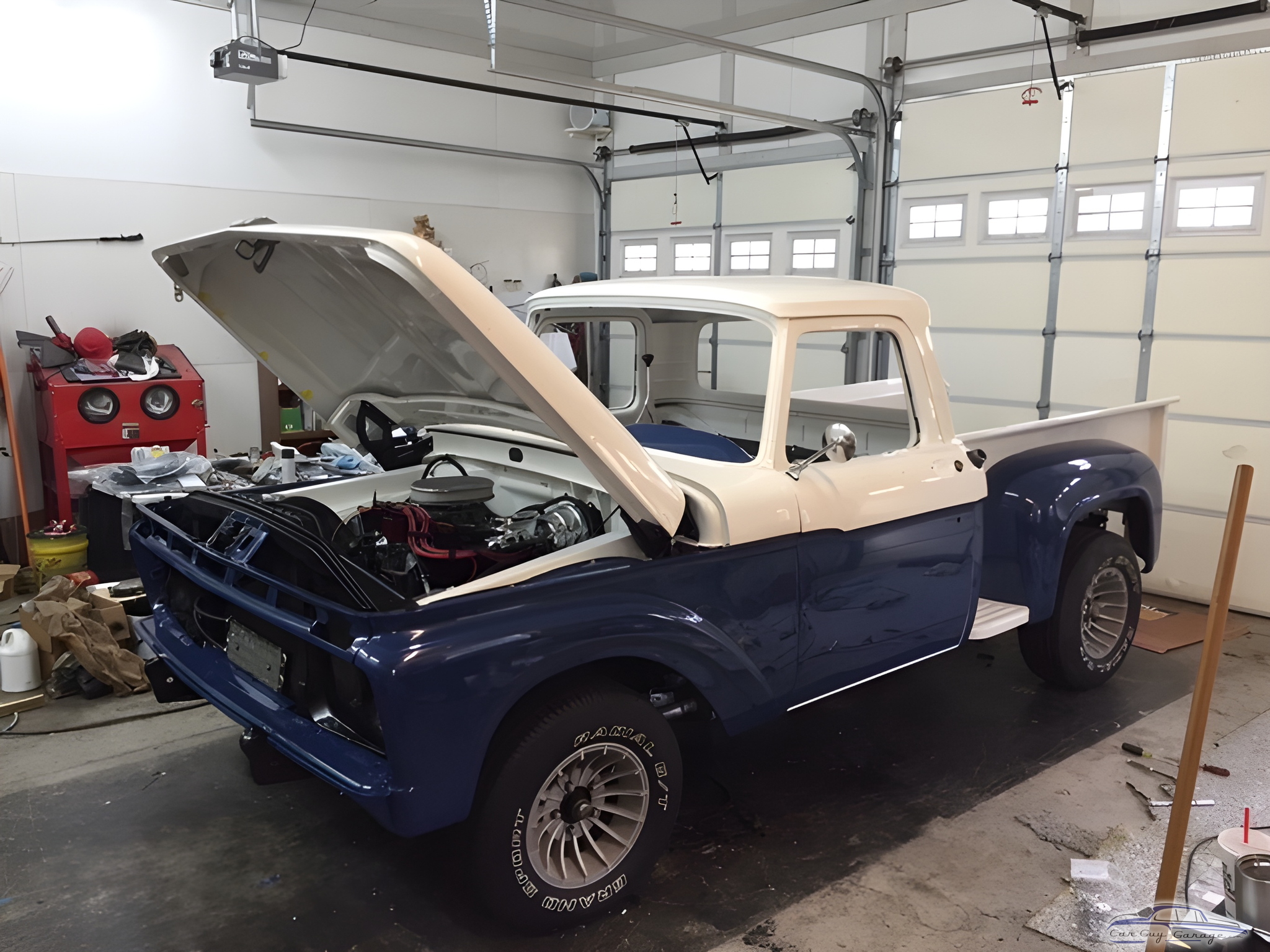 Restored Blue and White Ford Truck in Garage - old ford guy from Canton, Georga