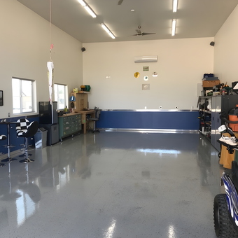 Organized garage with workbench, tool cabinets, and seating - James from Pahrump, Nevada