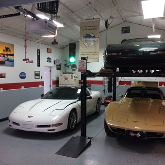 Classic Corvette Garage with Car Lift and Decor - Vander's Vettes from Panama City, FL