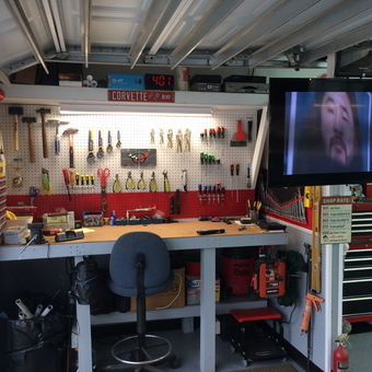 Organized Garage Workbench With Tools and TV - Vander's Vettes from Panama City, FL